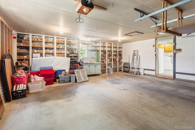 534 Crestone Ave, Salida, CO 81201 - garage featuring a garage door opener and washer / clothes dryer