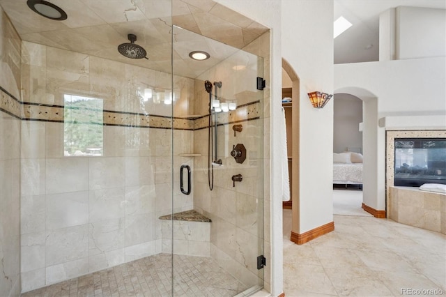 16442 Rocky Point Ln, Morrison, CO 80465 - ensuite bathroom featuring a stall shower and tile patterned flooring