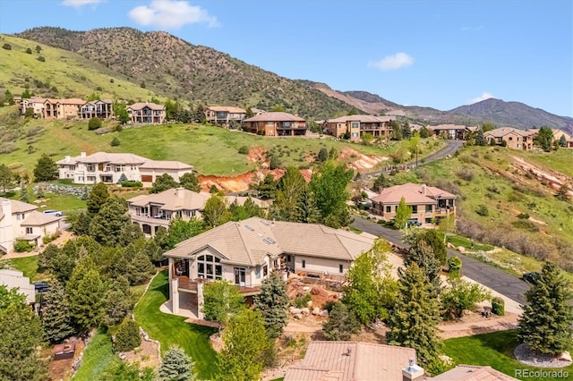 16442 Rocky Point Ln, Morrison, CO 80465 - aerial view of residential area with a mountainous background