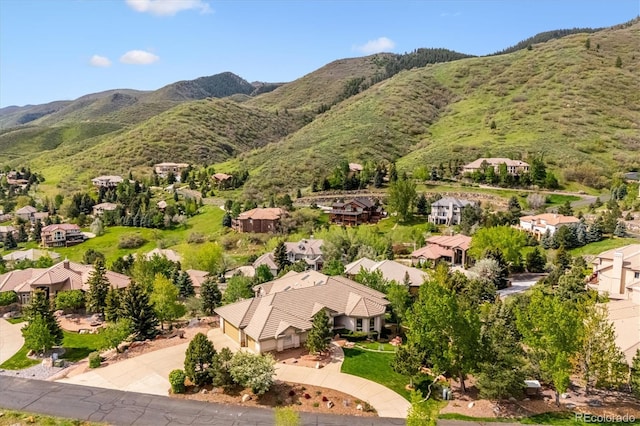 16442 Rocky Point Ln, Morrison, CO 80465 - aerial perspective of suburban area with a mountain backdrop