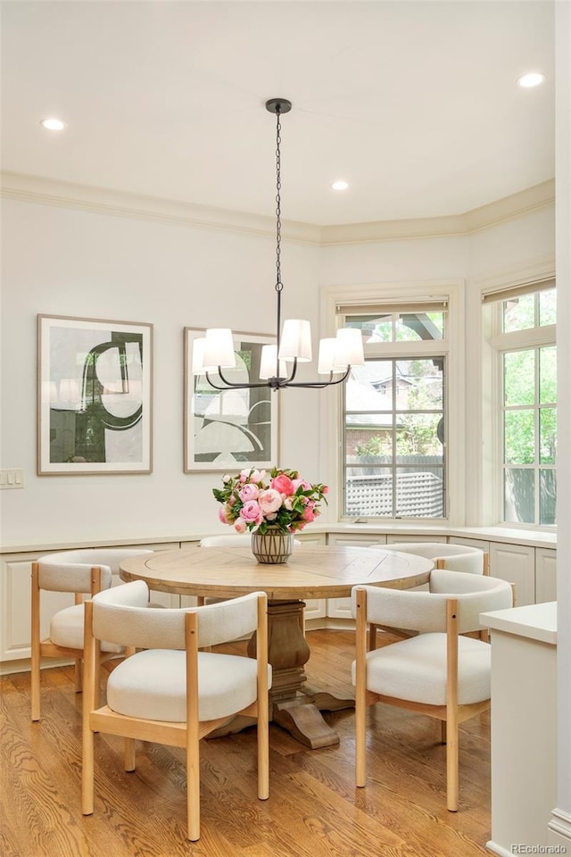 958 S Columbine St, Denver, CO 80209 - dining area with breakfast area, crown molding, light wood-style flooring, a chandelier, and recessed lighting