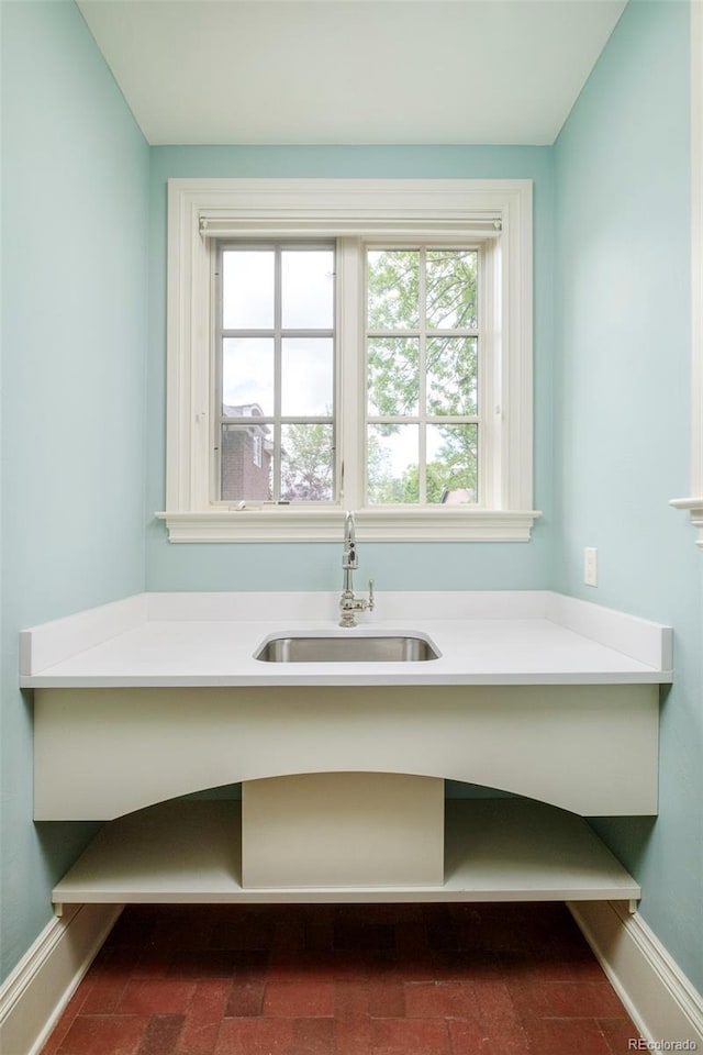 958 S Columbine St, Denver, CO 80209 - bathroom featuring a sink, healthy amount of natural light, and baseboards