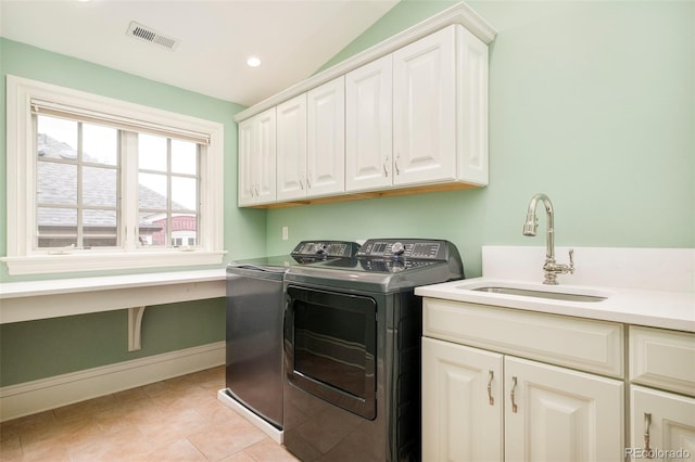 958 S Columbine St, Denver, CO 80209 - laundry area featuring washer and dryer, cabinet space, baseboards, light tile patterned floors, and recessed lighting