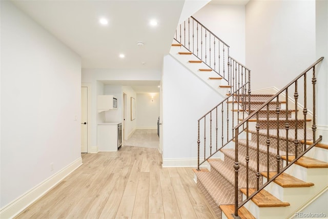958 S Columbine St, Denver, CO 80209 - stairway with wood finished floors, baseboards, and recessed lighting