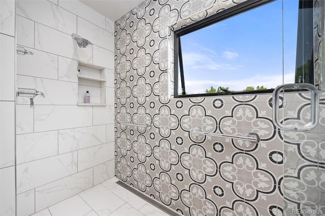 1579 W Costilla Pl, Littleton, CO 80120 - bathroom with tiled shower and marble look tiles