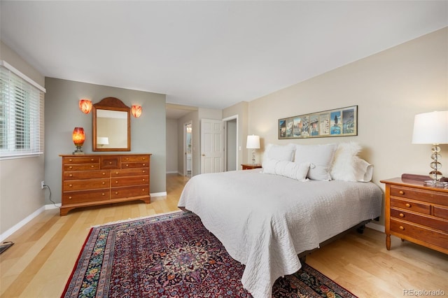 1579 W Costilla Pl, Littleton, CO 80120 - bedroom featuring light wood-type flooring and baseboards