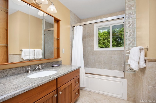 1579 W Costilla Pl, Littleton, CO 80120 - bathroom with vanity, shower / bath combo with shower curtain, and tile patterned floors
