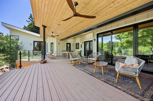 1579 W Costilla Pl, Littleton, CO 80120 - deck featuring a ceiling fan and outdoor dining area