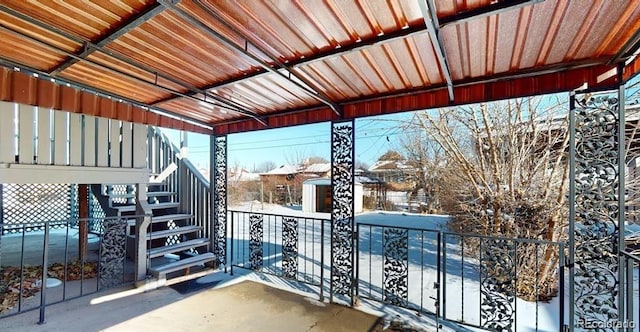 view of snow covered patio