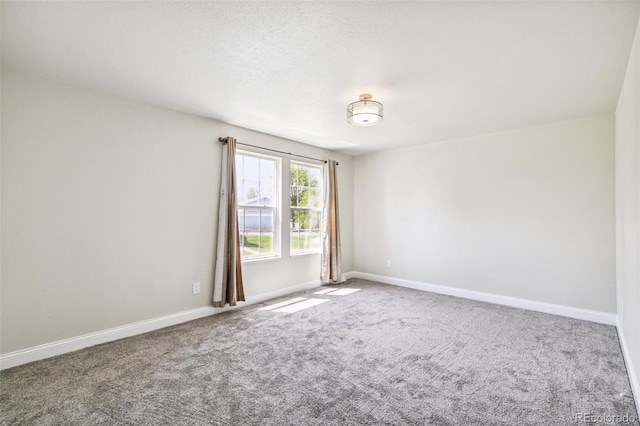 12020 E Canal Dr, Aurora, CO 80011 - unfurnished room featuring carpet floors and baseboards
