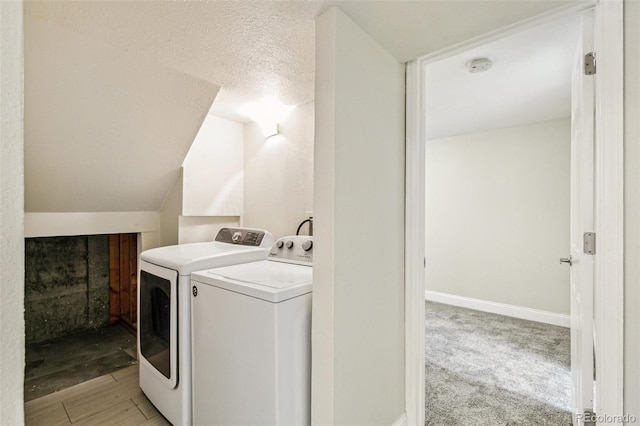 12020 E Canal Dr, Aurora, CO 80011 - laundry area featuring washing machine and dryer and baseboards