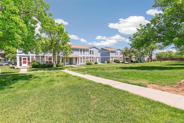 12020 E Canal Dr, Aurora, CO 80011 - view of community featuring a lawn