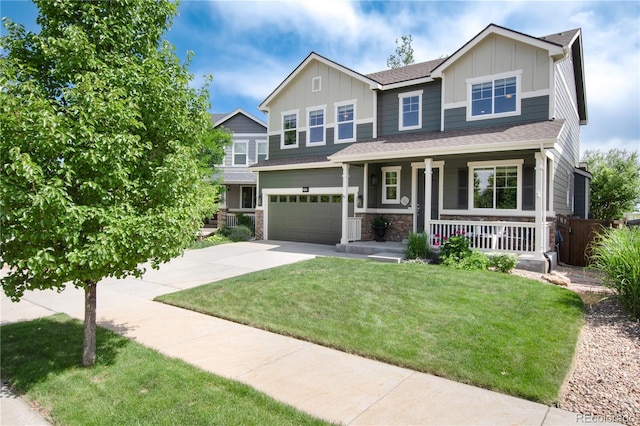 3027 Walnut Grove St, Erie, CO 80516 - craftsman inspired home featuring a porch, board and batten siding, an attached garage, driveway, and stone siding