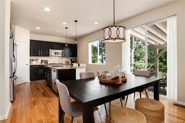 3027 Walnut Grove St, Erie, CO 80516 - dining room featuring recessed lighting and light wood finished floors