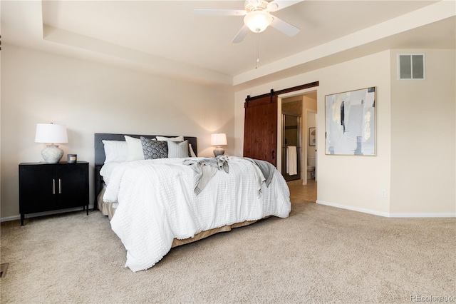 3027 Walnut Grove St, Erie, CO 80516 - bedroom with light colored carpet, a tray ceiling, ceiling fan, and a barn door