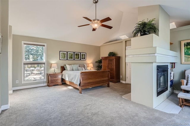 bedroom featuring light carpet, high vaulted ceiling, and ceiling fan