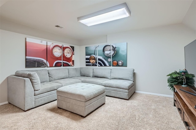 living room with carpet floors and vaulted ceiling