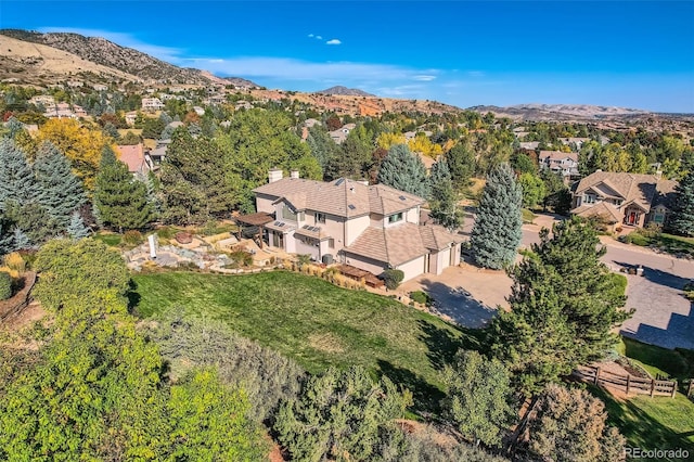 birds eye view of property featuring a mountain view