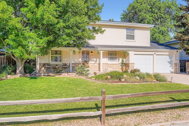 2514 S Elkhart St, Aurora, CO 80014 - traditional-style home featuring a porch, stone siding, concrete driveway, and stucco siding