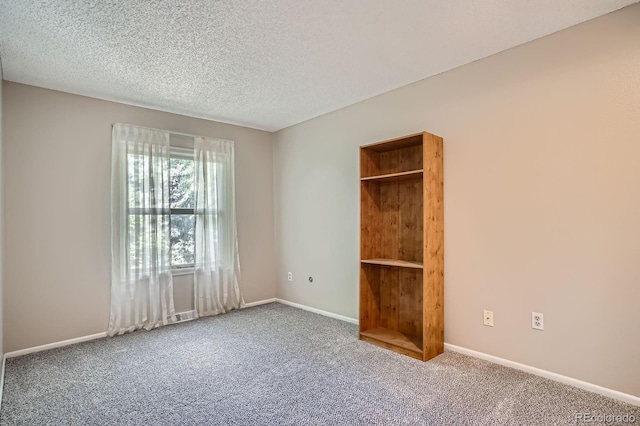 2514 S Elkhart St, Aurora, CO 80014 - unfurnished bedroom with carpet and a textured ceiling