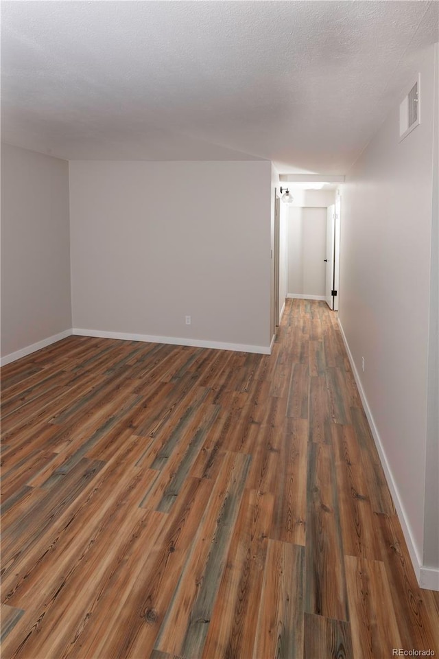 7255 E Quincy Ave Unit 205, Denver, CO 80237 - unfurnished room featuring wood finished floors and baseboards