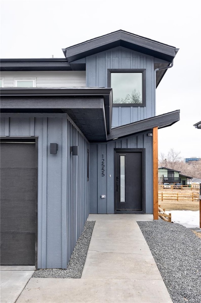 property entrance with board and batten siding