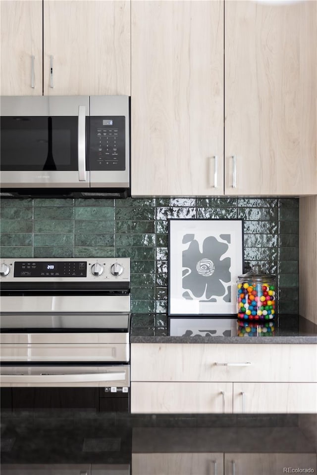 kitchen with wall oven, dark stone counters, stainless steel microwave, light brown cabinets, and backsplash