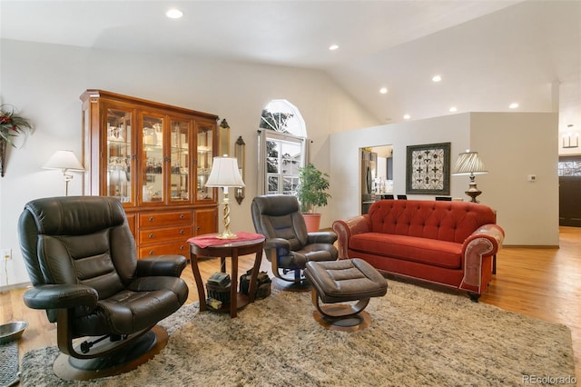 6545 Bonifas Ct, Colorado Springs, CO 80919 - living area with recessed lighting, vaulted ceiling, and wood finished floors