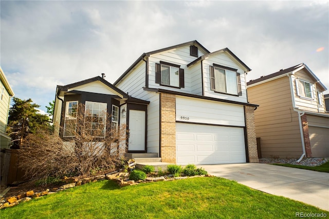 9950 Sydney Ln, Highlands Ranch, CO 80130 - view of front facade with brick siding, an attached garage, and concrete driveway