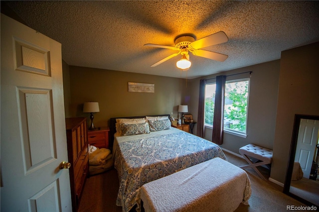 9950 Sydney Ln, Highlands Ranch, CO 80130 - carpeted bedroom featuring a textured ceiling, baseboards, and ceiling fan