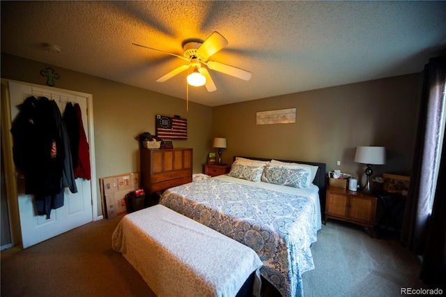 9950 Sydney Ln, Highlands Ranch, CO 80130 - bedroom featuring carpet, a ceiling fan, a closet, and a textured ceiling