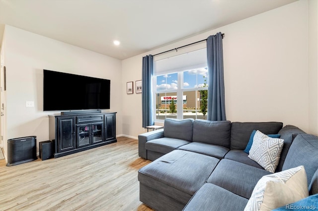 8586 Holman Ct Unit A, Arvada, CO 80005 - living area featuring wood finished floors, baseboards, and recessed lighting