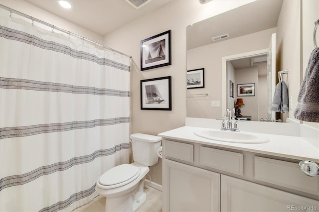 8586 Holman Ct Unit A, Arvada, CO 80005 - full bath with toilet, vanity, and a shower with shower curtain