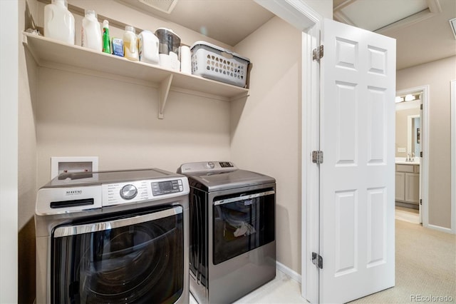 8586 Holman Ct Unit A, Arvada, CO 80005 - washroom featuring independent washer and dryer, light colored carpet, and baseboards