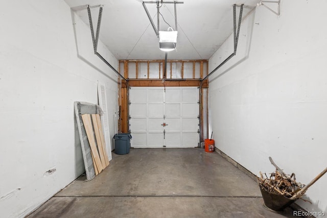 10212 W 80th Dr Unit C, Arvada, CO 80005 - garage featuring a garage door opener