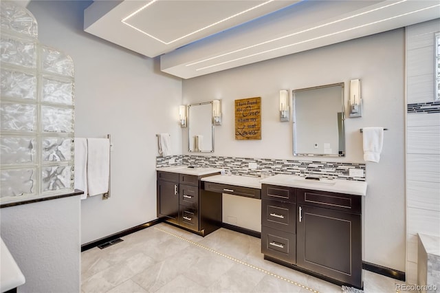 9451 Desert Willow Trl, Highlands Ranch, CO 80129 - full bathroom featuring vanity and decorative backsplash