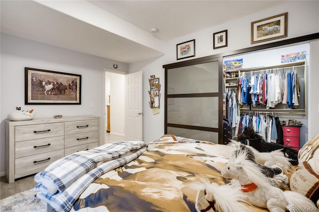 9451 Desert Willow Trl, Highlands Ranch, CO 80129 - bedroom featuring a closet and light wood-style flooring