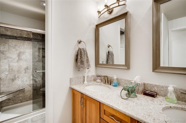 9451 Desert Willow Trl, Highlands Ranch, CO 80129 - full bathroom with double vanity and a stall shower