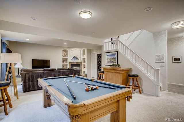 9451 Desert Willow Trl, Highlands Ranch, CO 80129 - rec room featuring light carpet, billiards table, baseboards, built in features, and a fireplace