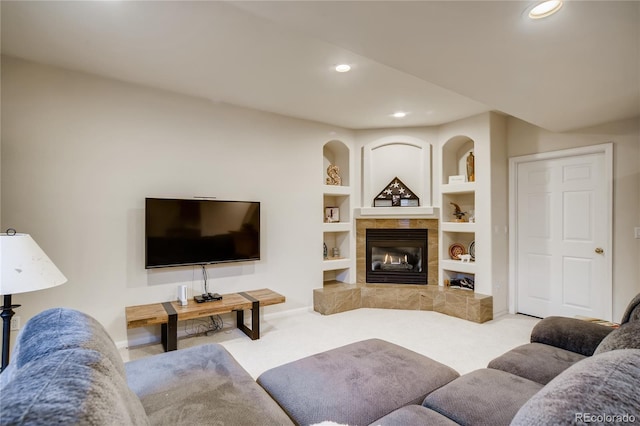 9451 Desert Willow Trl, Highlands Ranch, CO 80129 - living room with carpet, recessed lighting, a tile fireplace, baseboards, and built in features