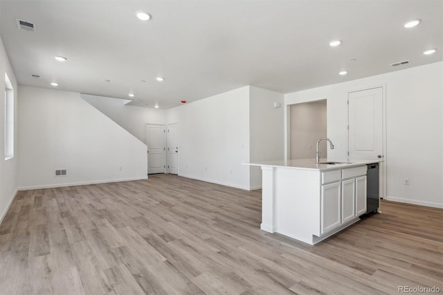 9672 Cathay St, Commerce City, CO 80022 - kitchen featuring visible vents, a sink, and recessed lighting