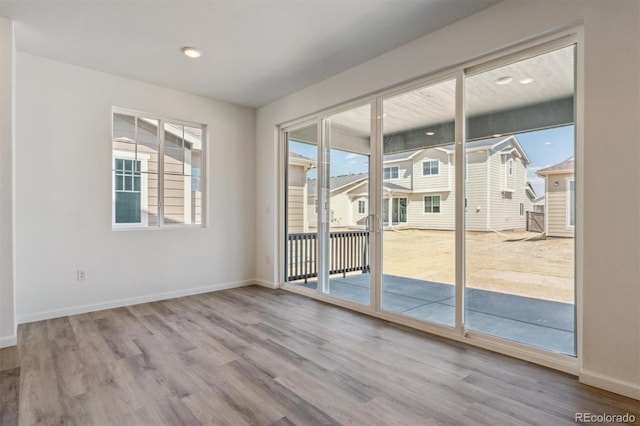 9672 Cathay St, Commerce City, CO 80022 - interior space featuring baseboards and wood finished floors