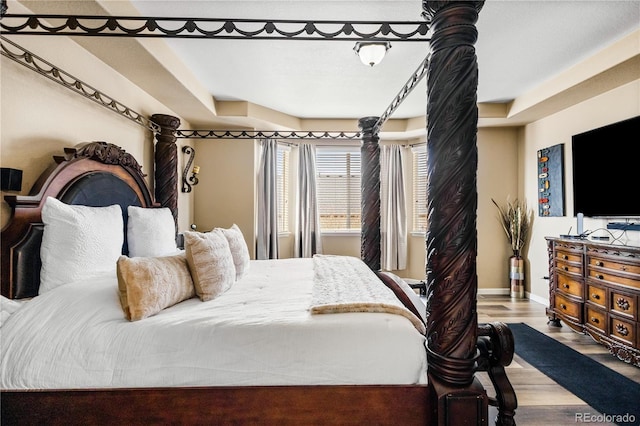 bedroom featuring hardwood / wood-style flooring