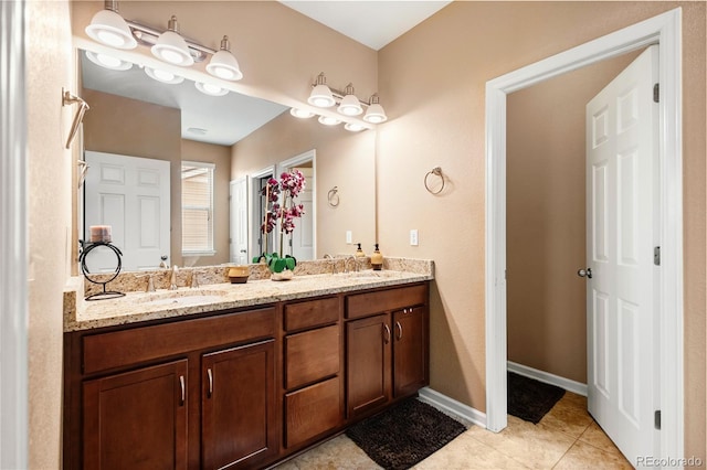 bathroom with vanity and tile patterned flooring