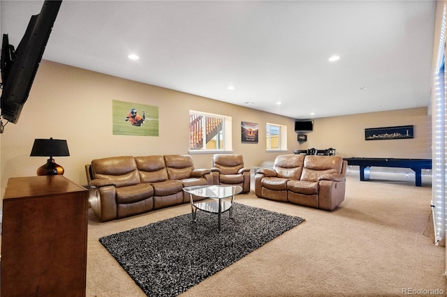 carpeted living room with billiards