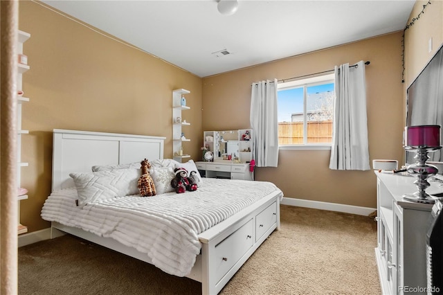 bedroom with light colored carpet