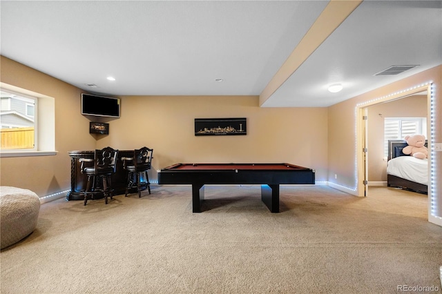 playroom with indoor bar, light colored carpet, and pool table