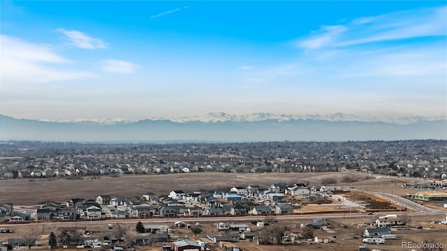 drone / aerial view featuring a mountain view