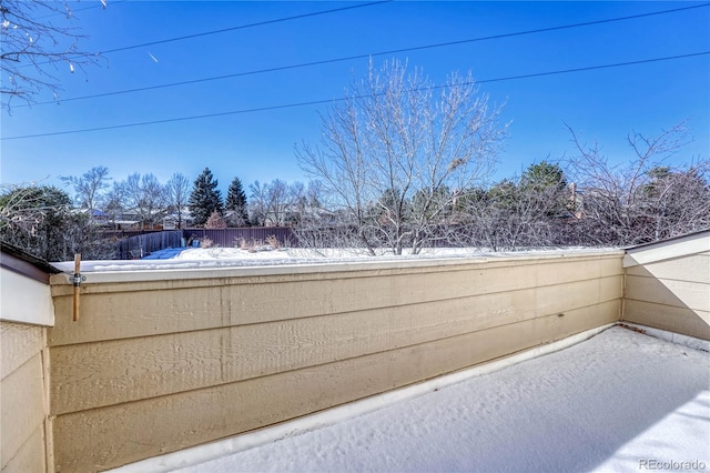 view of yard covered in snow