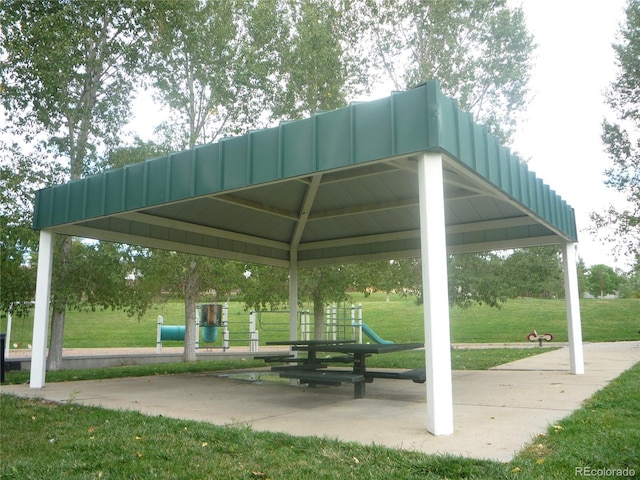 surrounding community featuring a gazebo and a lawn